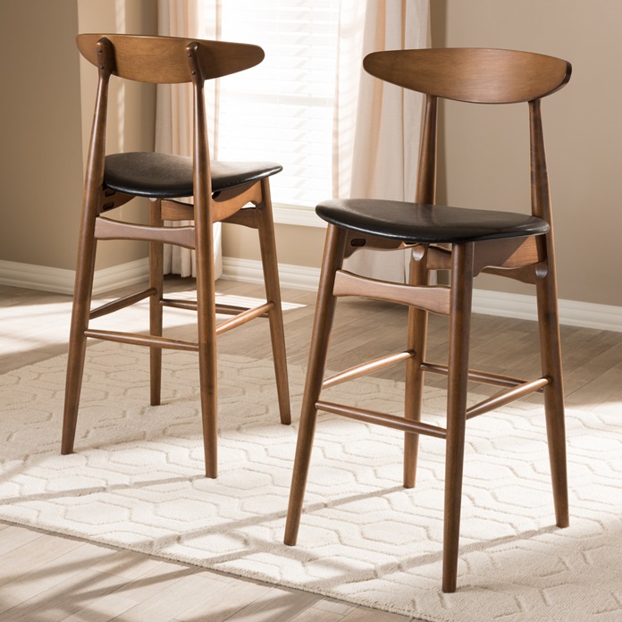 wooden retro barstools in a middle of a room