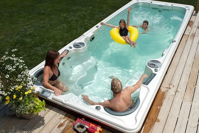 family swim spa in garden